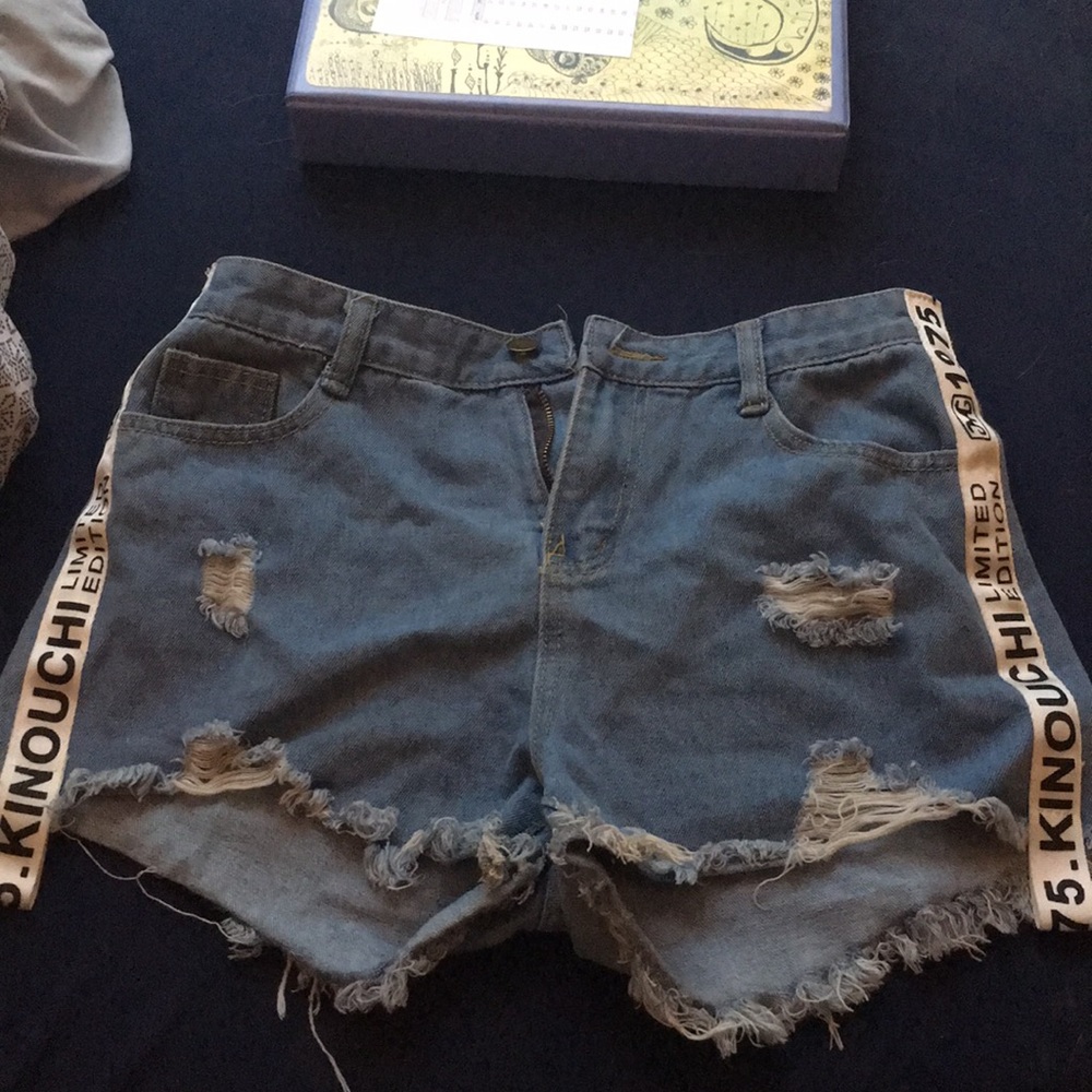 Size large Shorts with words on sides